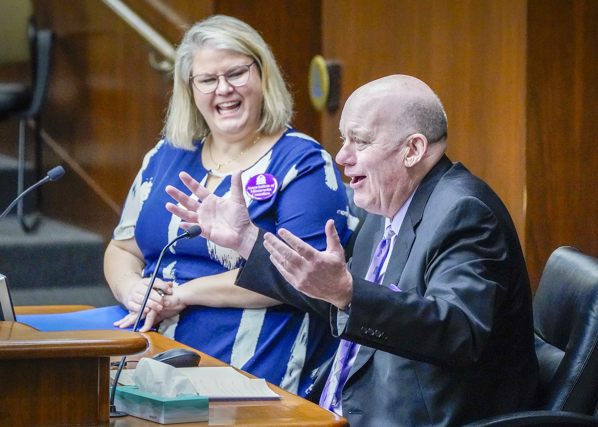 St. Louis County Commissioners Annie Harala and Paul McDonald provide animated testimony before the House Property Tax Division Feb. 21 during a discussion on implementation of new local government aid. (Photo by Andrew VonBank)